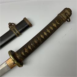 WW2 Japanese Army officer's shin gunto/katana sword with 68.5cm steel single edged blade, foliate cast brass tsuba, bound fish-skin grip with brass mounts, inscribed marks to both sides of tang; in lacquered wooden scabbard with brass mounts and locking button L97cm overall