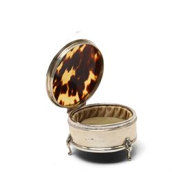 Silver circular ring box with hinged tortoiseshell cover, glass block inkwell with pique tortoiseshell cover Birmingham 1921 and a silver napkin ring (3)