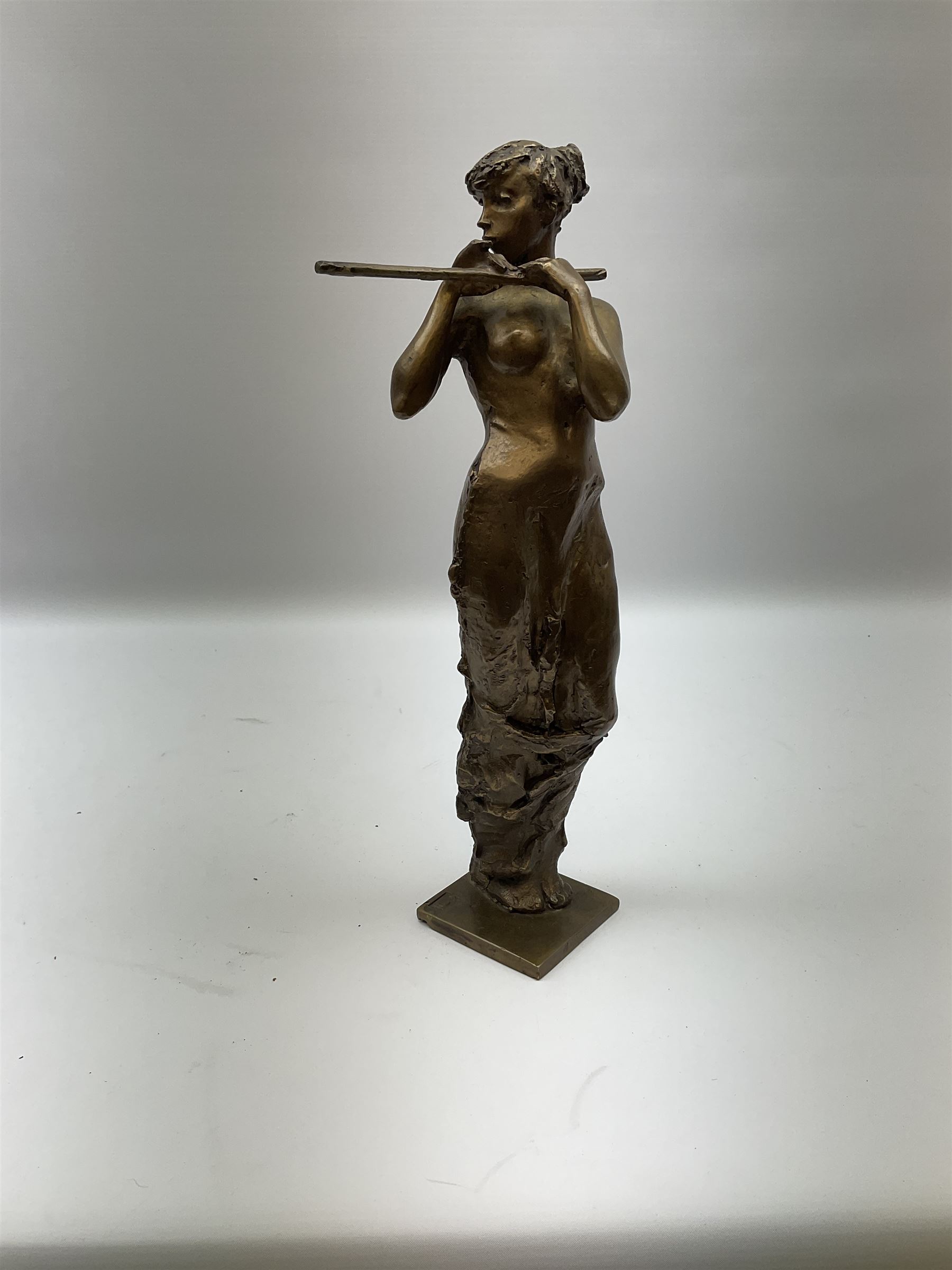 Sasa Zahradnik (Czech, B1950), bronze figure of a female flute player, with impressed stamp to the base, H34cm