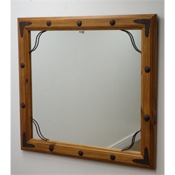  Large rectangular pine framed mirror with metal strapping and studs, W103cm, H93cm  