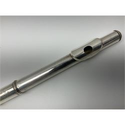 Boosey & Hawkes London Regent three-piece flute, serial no.345447; in B&H Bandhite hard carrying case; and Deg Music Company Inc. USA Claudel Model three-piece flute, serial no.491718, in hard carrying case (2)