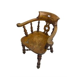 19th century smoker's bow chair, shaped cresting rail over tub back with turned spindle supports and club pierced splat, saddle seat over octagonal turned supports united by X-stretcher