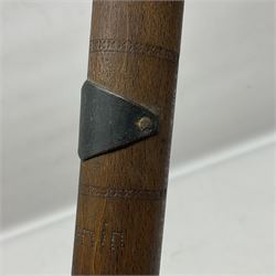 WW1 Prisoner of War carved beech walking cane, the terminal as a head wearing a helmet, and inscribed 'Souvenir from 370th PoW Coy Menin 1919'; bears metal plaque with indistinct monogram L91cm