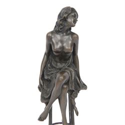 Art Deco style bronze modelled as a semi naked female figure, seated upon a chair, after 'Pierre Collinet', H27cm