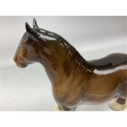 Three Beswick models comprising Hereford Bull no 949, 'CH Cutmil Cupie' Pug, and bay Shire horse, all with printed marks beneath