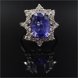  White gold emerald cut purple sapphire and diamond cluster ring, hallmarked 18ct  