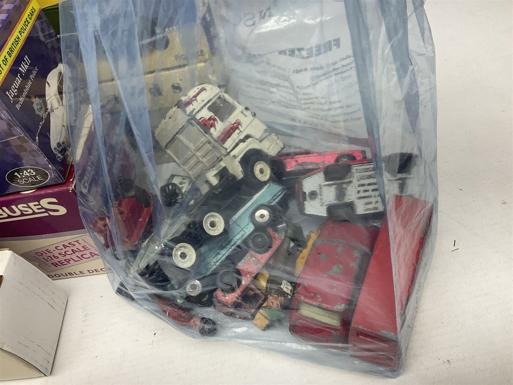 Eight Vanguards die-cast models by Corgi, Hornby and Lledo including Land Rovers, Ford Anglia and Triumph; together with thirteen other modern die-cast models by Bburago, Oxford, Atlas, EFE, Solido etc; all boxed; and small quantity of unboxed and playworn models
