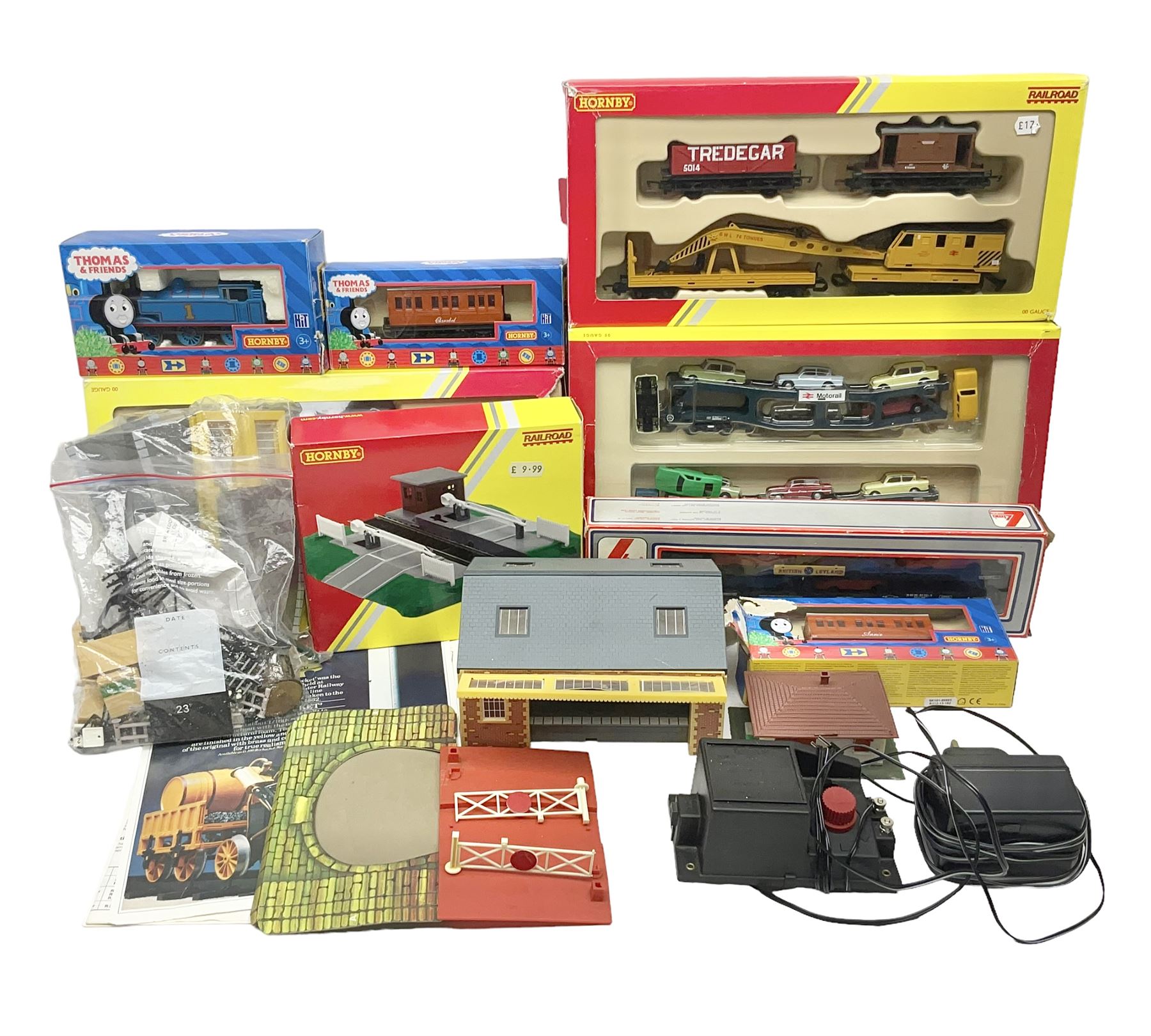Hornby '00' gauge - Thomas the Tank Engine and Friends 0-6-0 tank locomotive No.1 with Annie and Clarabel coaches; all boxed; Breakdown Pack, Car Transporter Pack, Fuel Tanker Pack and Automatic Level Crossing; all boxed; Lima Car Transporter; boxed; and quantity of trackside accessories etc