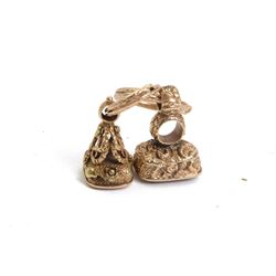 Two late 18th/early 19th century gold fob seals, the first 12ct example with amethyst matrix engraved with the letter D, the second 18ct example with bloodstone matrix, each within a foliate mount united by two 14ct ouroboros snake split rings, each seal approximately H2.5cm

Provenance: By family descent from the Chichesters of Arlington Court, Devon; from the collection of Andrew Chichester Everitt.