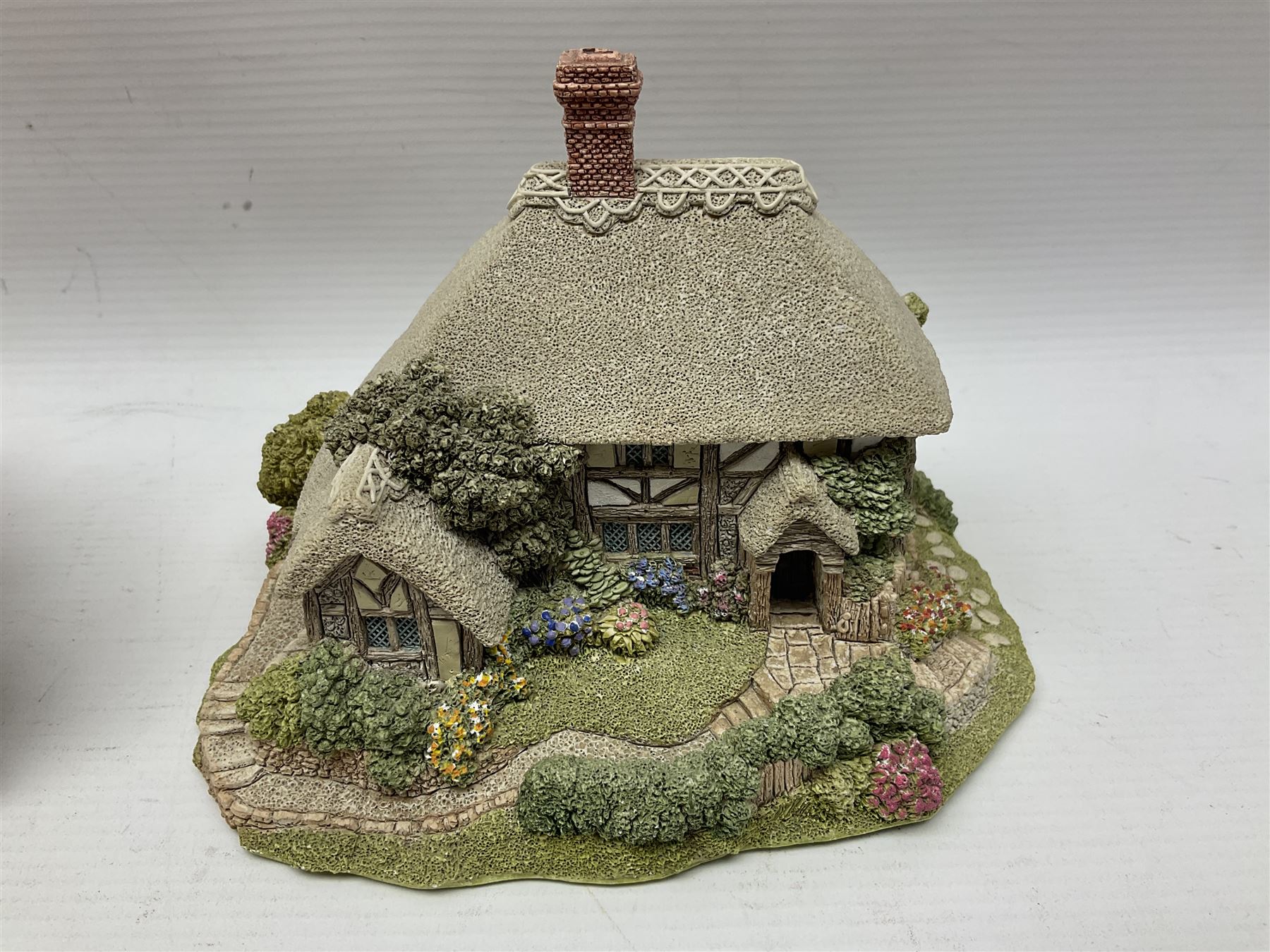 Twelve Lilliput Lanes, including Old Shop Bignor, Dial Cottage, Paradise Lodge, etc, some with deeds and original boxes