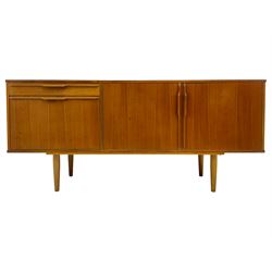 Morris of Glasgow - mid-20th century teak sideboard, fitted with double cupboard and single drawer above fall-front cabinet, raised on tapering supports