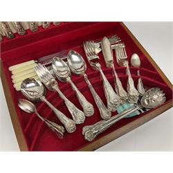 Canteen of King's pattern cutlery for six place settings by James Ryals of Sheffield, with two extra forks, pair of salad servers and six fish knives, all within fitted wooden case, together with six ivorine handled butter knives and six silver plated cake forks