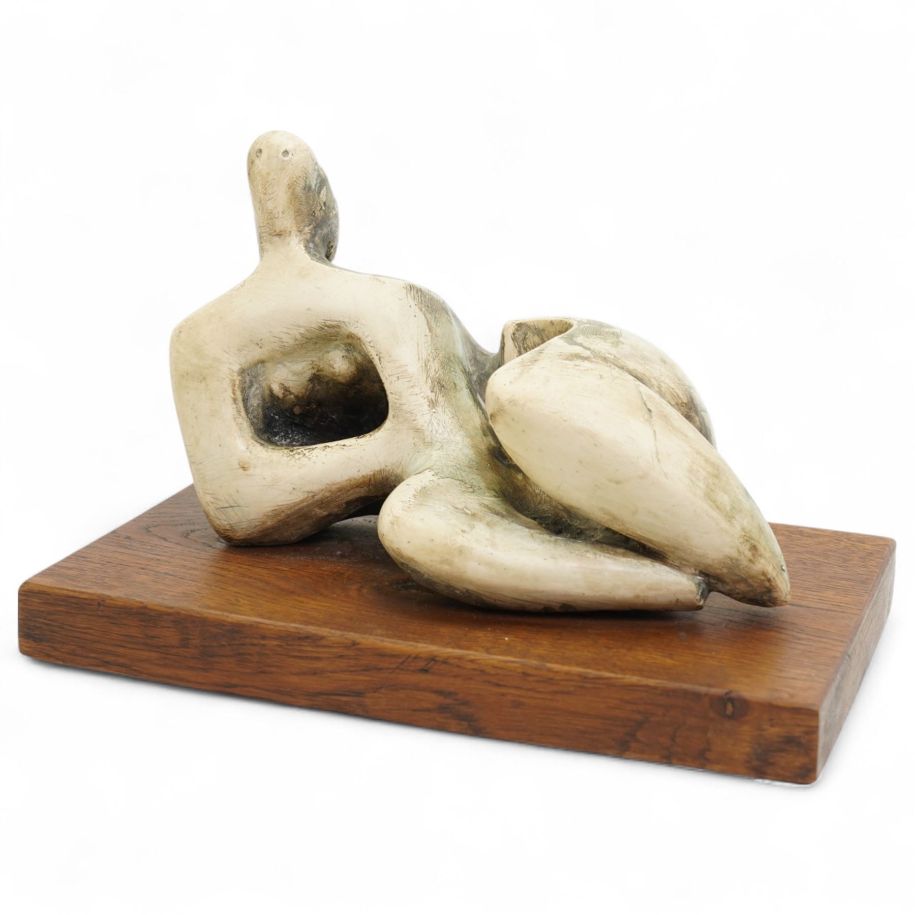 After Henry Moore (British 1898-1986): 'Reclining Figure Curved', terracotta maquette sculpture, base marked with affixed catalogue label inscribed 'Reclining Figure: Curved: 1976 Archive 0070930', W25cm H16cm