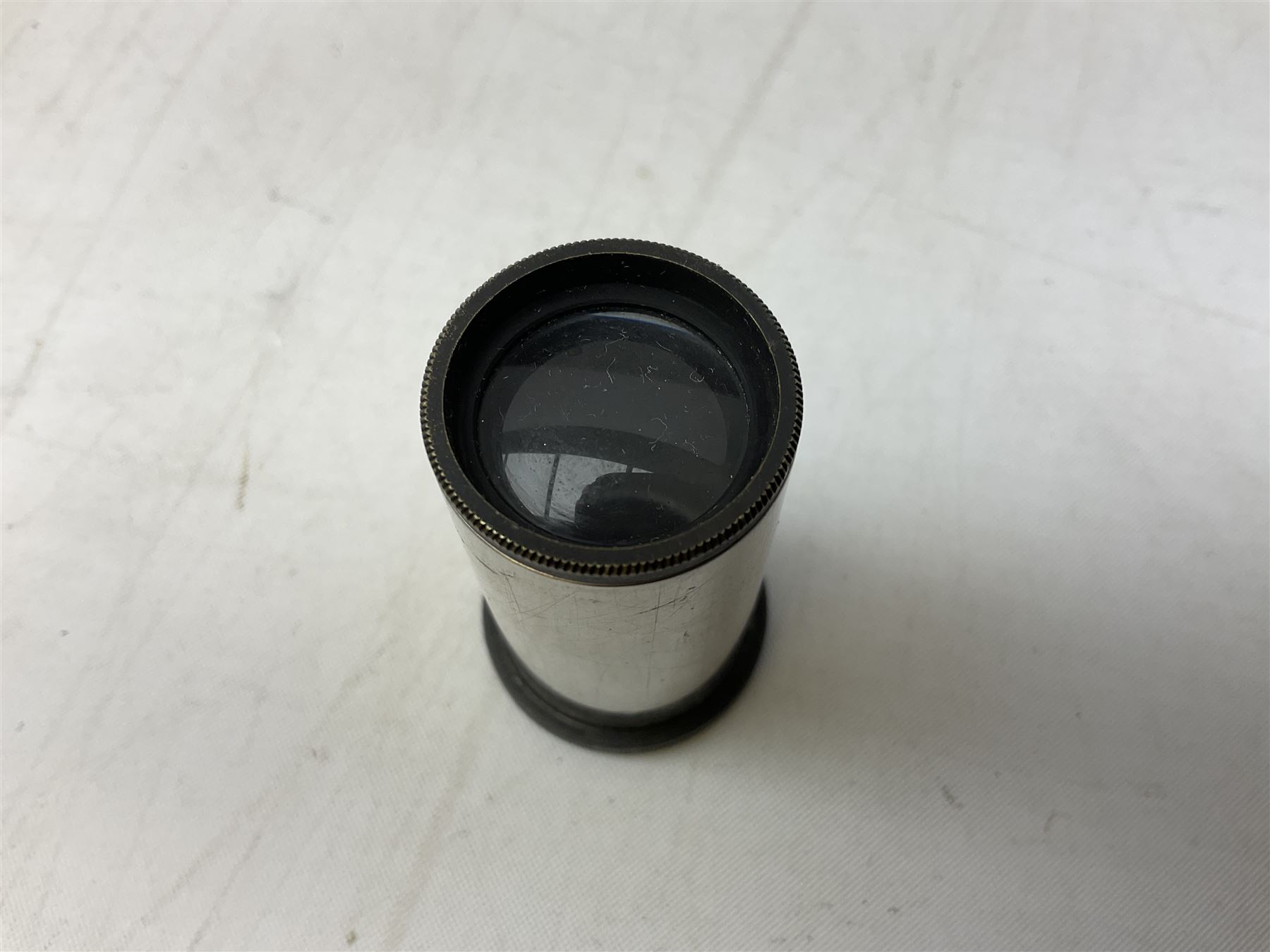  Brass field microscope, together with a cased microscope and twenty five microscope slides