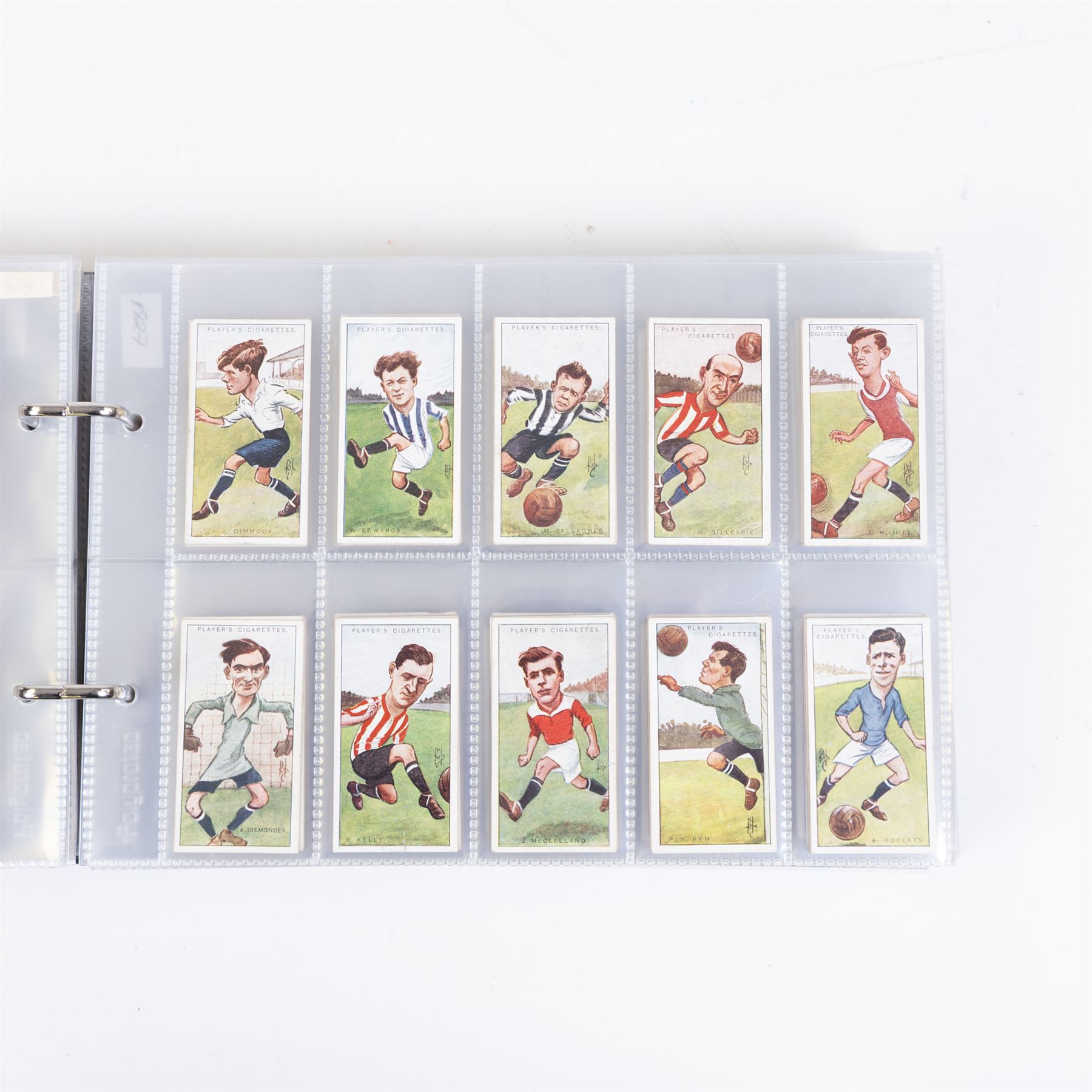 Collection of Edwardian and later Football related trading and cigarette cards, including forty-nine of fifty 1906 Ogden's Football Club Colours, 1922 PALS Footall series, ninety of one hundred 1925 Gallaher Famous Footballers, complete set of forty-four 1926 Ogden's Captains of Association Football Clubs and Colours, complete set of fifty 1927 Players Football Caricatures by MAC,  complete set of fifty 1927 Players Football Caricatures by RIP,  complete set of fifty 1930 Players Association Cup Winners, complete set of 50 1933 Ogdens AFC Nicknames etc, housed in brown cigarette card album