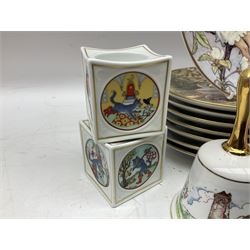 Royal Worcester Flower Fairies oval collectors plates, Goebel mustard pot, two Danbury Mint Fairy Tale bells, and pair of Hutschenreuther candlesticks decorated with scenes of Puss in Boots