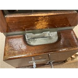 Early 20th Century Time Recorders Leeds Ltd mahogany cased clocking in machine, the square silvered dial with Arabic numerals above clocking in mechanism on plinth base, with a collection of blank clocking in cards, case H98cm