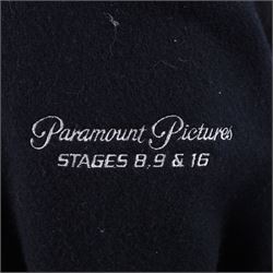 Star Trek The Next Generation 10th anniversary jacket, leather sleeves and collar with embroidered decoration throughout, including 10th anniversary emblem to back, 'Star Trek The Next Generation' to collar, 'Paramount Pictures Stages 8,9 & 16' to front and seven character names to interior, in size XXXXL, purchased in 1990s from Star Trek Experience Las Vegas