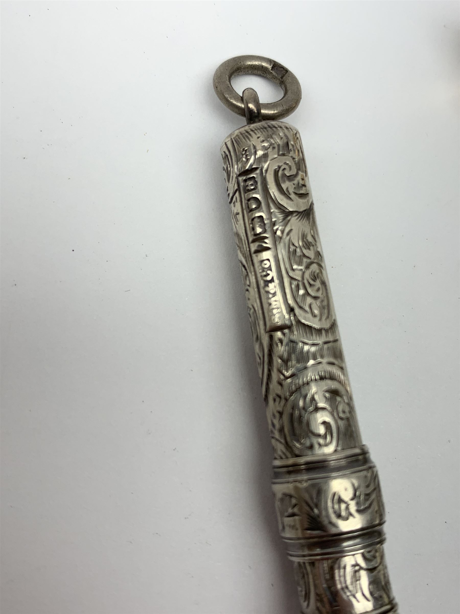 A late Victorian Sampson Mordan & Co silver push action propelling pencil, with foliate engraved decoration and suspension ring terminal, hallmarked Sampson Mordan & Co, London 1896, together with a group of vintage pens including examples by Eversharp, a number marked Silver Plated, Rolled Gold, and Gold Filled. 
