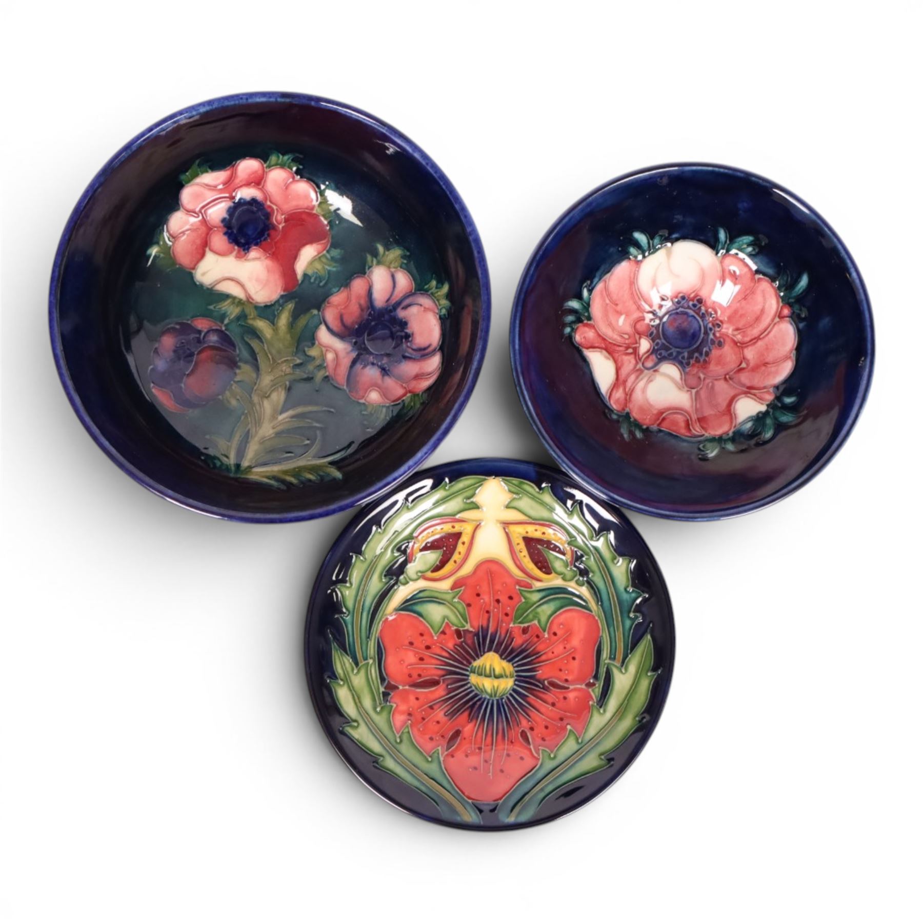 Two Moorcroft Amemnoe pattern bowls, together with a Anna Lily pattern dish, largest bowl D13cm