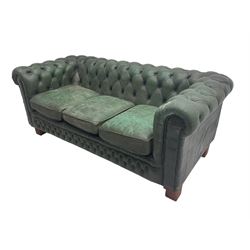 Mid-20th century three seat Chesterfield sofa, upholstered in buttoned green leather with studwork, on square supports