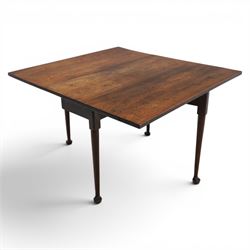 18th century solid walnut drop leaf table, with gate legs terminating in pad feet
