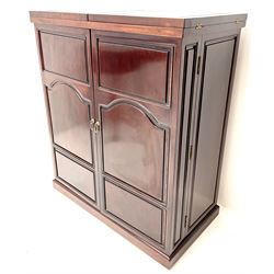 Chinese rosewood cocktail bar, hinge folding top, above two cupboard doors enclosing fitted interior, platform base
