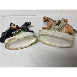 Staffordshire figure of the Duke of Wellington on a bay horse, H30cm in red uniform, together with a similar Staffordshire figure of Dick Turpin, pair of Staffordshire style dogs, H27cm, three Meissen style double salts and two trinket boxes 