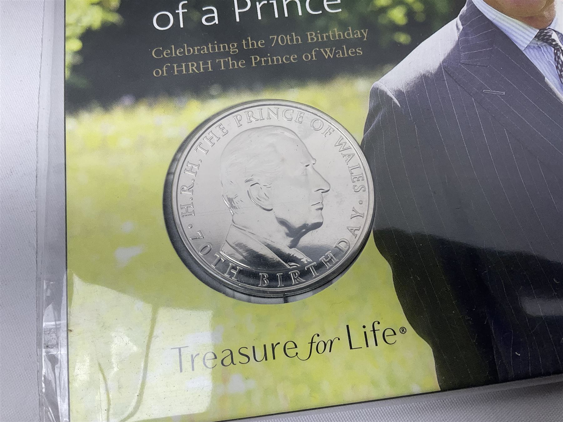 Commonwealth Of The Bahamas 1978 silver proof ten dollars coin with certificate, Queen Elizabeth II Turks and Caicos Islands silver twenty crowns coin in commemorative first day cover, The Royal Mint United Kingdom 2018 'Celebrating the 70th Birthday of HRH The Prince of Wales' five pound coin in card folder and 2022 The Snowman and The Snowdog coloured fifty pence coin