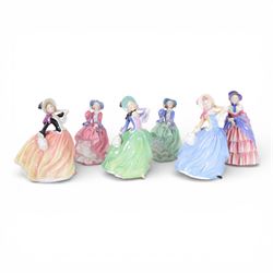 Six Royal Doulton figures, comprising Victorian Lady HN728, Top of the Hill in two colourw...