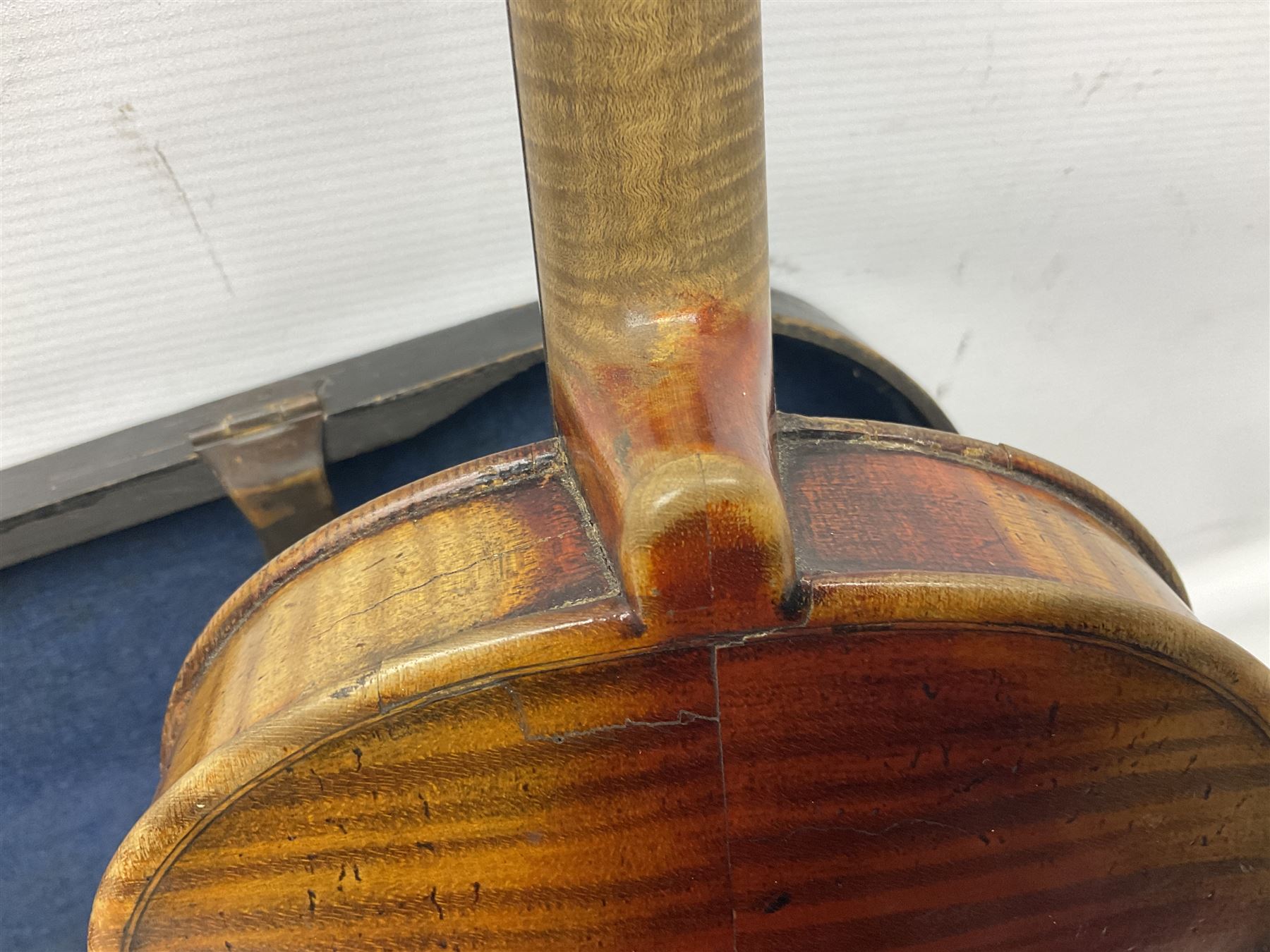 Late 19th century French three-quarter size 'Conservatory' violin with 34cm two-piece maple back and ribs and spruce top, the peg box inscribed 'Conservatory Violin Straduari', bears label 'Antonius Stradiuarius Cremonensis Faciebat Anno 1721' L55.5cm overall; in ebonised wooden 'coffin' case