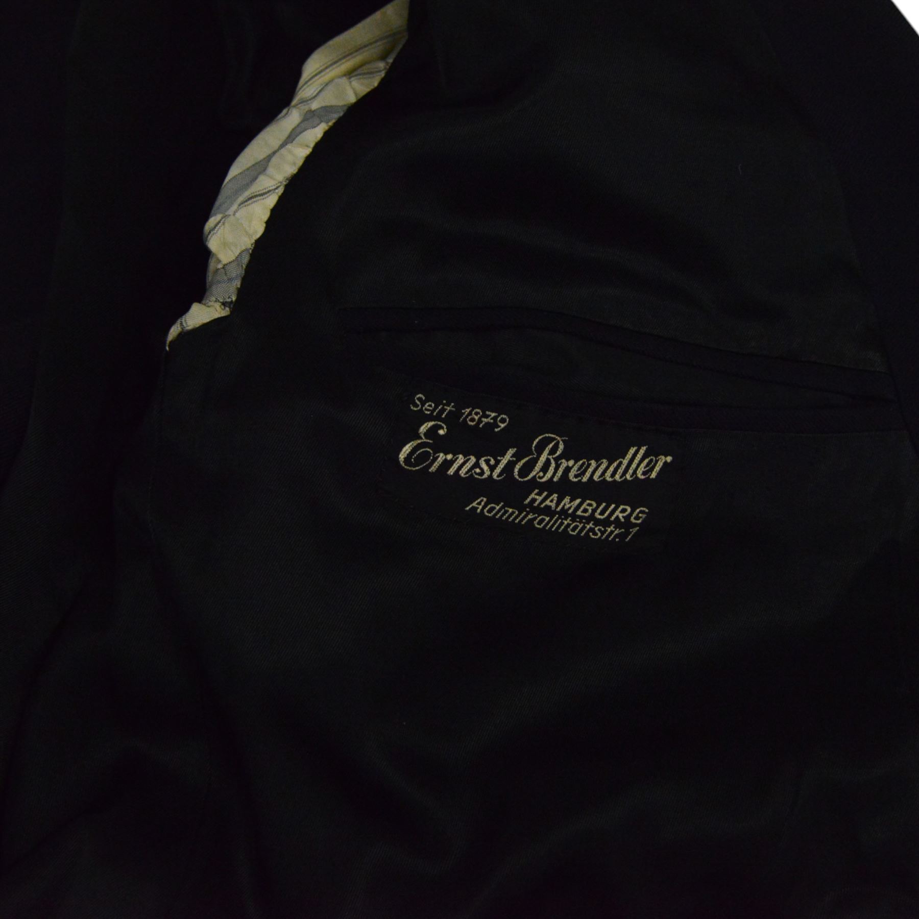 German World War II Kreigsmarine navy blue jacket by Ernst Brendler, Hamburg, with ribbon band, National Emblem and  anchor brass buttons