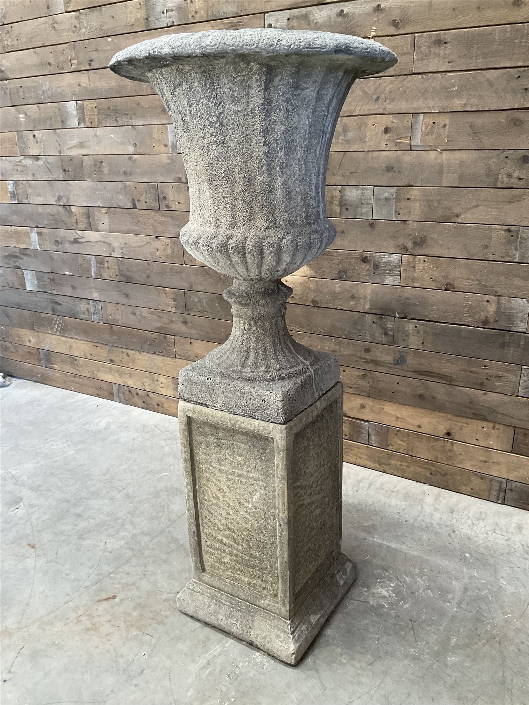 Large Georgian design cast stone garden centre-piece urn, egg and dart border, tapering column on square base, raised on square column