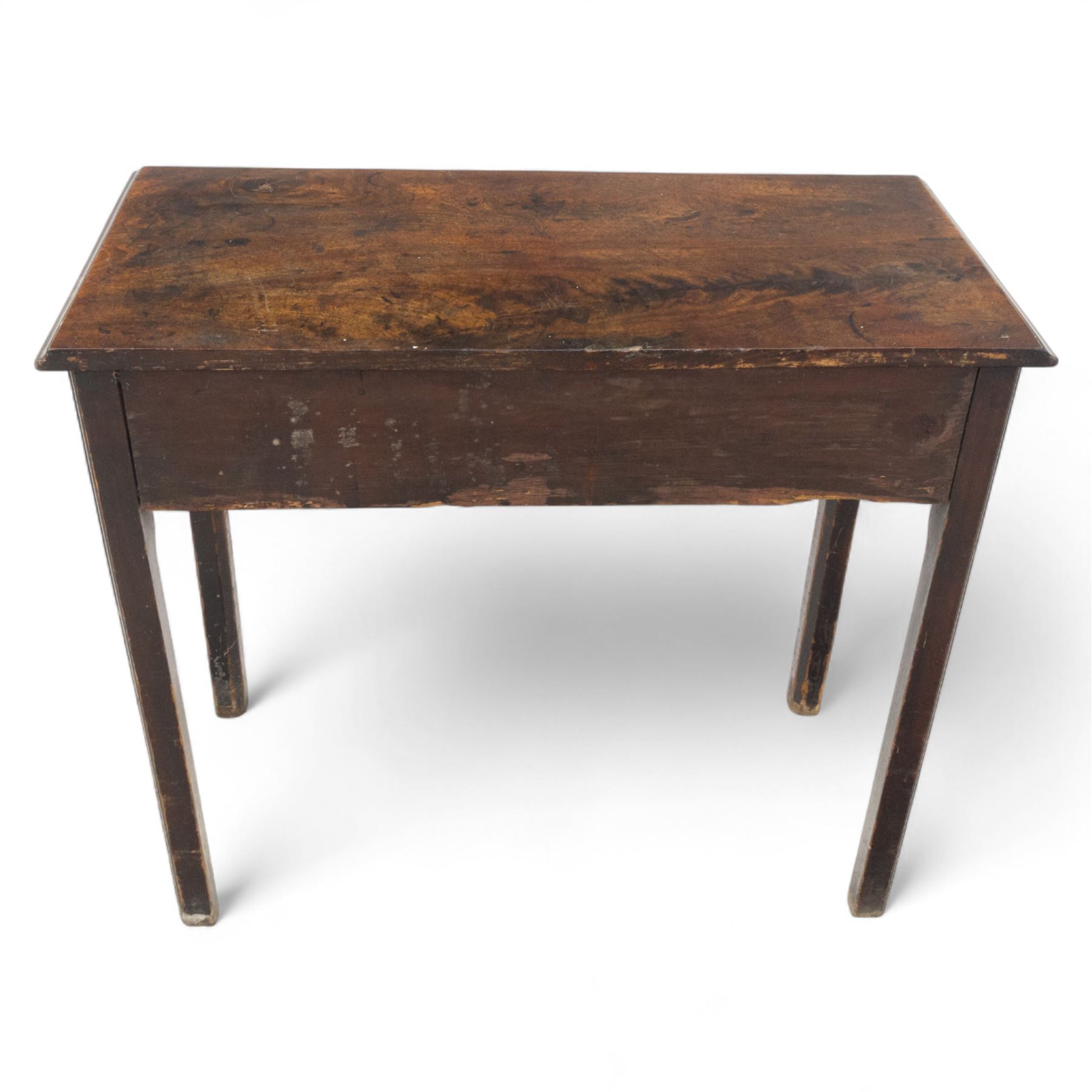 George III mahogany side table, the rectangular moulded top above a single frieze drawer fitted with brass swan neck handles, above a shaped serpentine apron raised upon square section legs, W86 D42 H75cm, together with a George III fretwork mirror, the rectangular plate within a gilt slip surmounted by a pierced crest with inset carved Ho-Ho bird, with shaped apron with gilt shell motif, H84cm W45cm