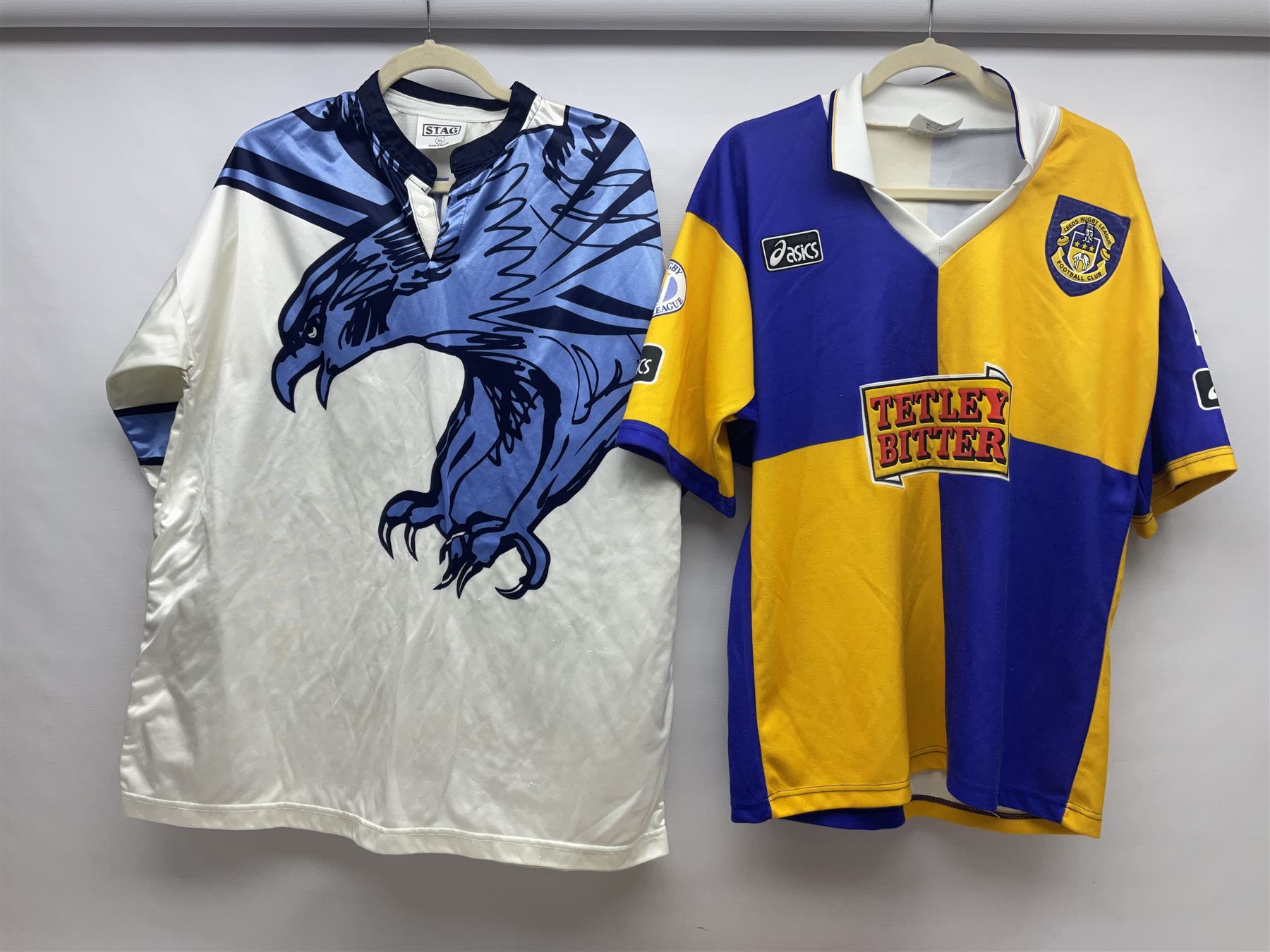 Eighteen Rugby League shirts, including Wigan, Leeds, Warrington and Huddersfield, etc and a Scotland international shirt