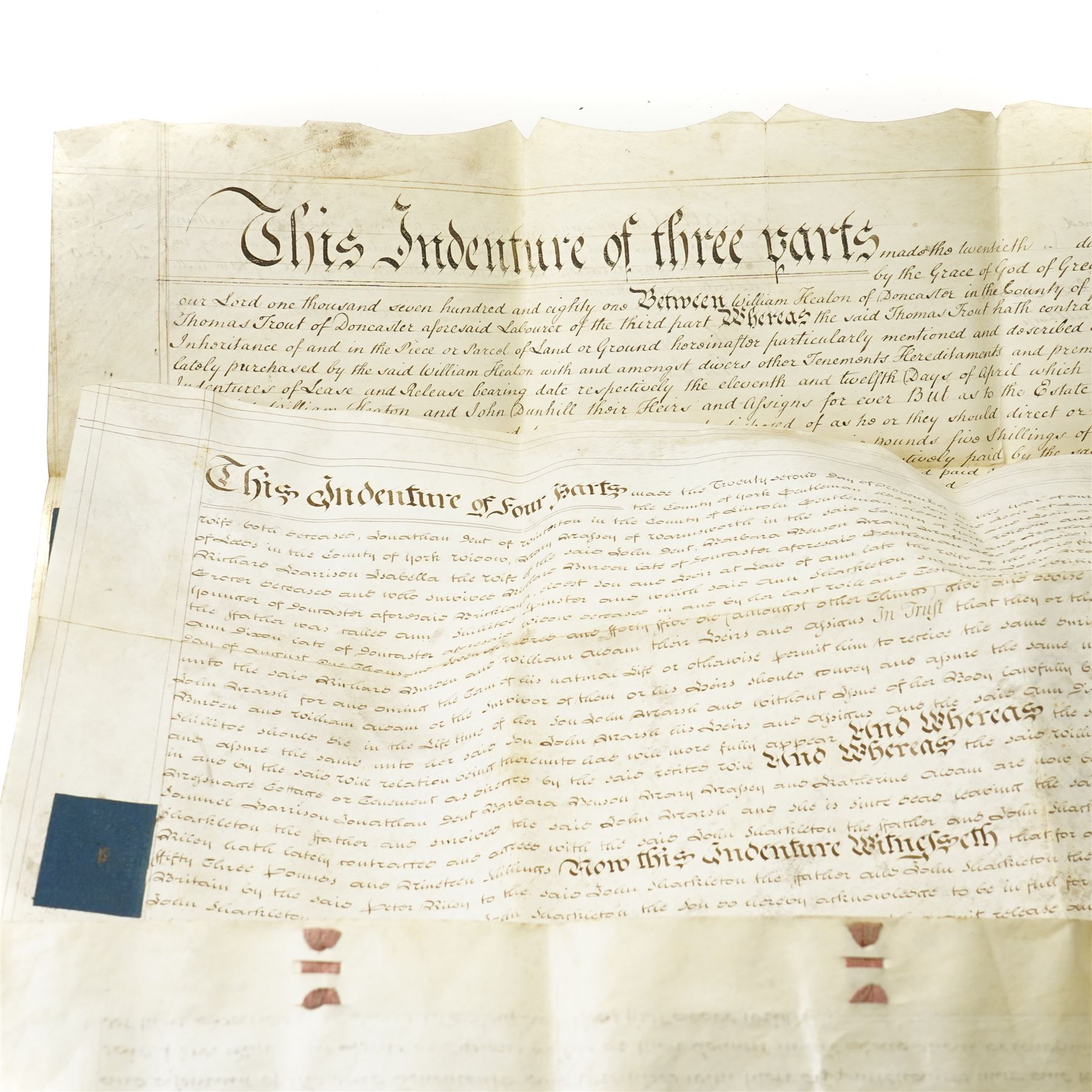  18th century indenture of three parts between William Heaton, Mercer of Doncaster, John Dunhill, Gentleman of Doncaster and Thomas Trout, Labourer 1781 and one other 18th century indenture (2) 