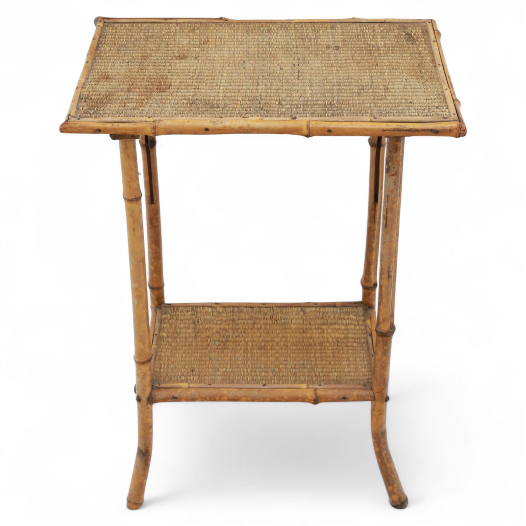 Early 20th century mahogany side table; with bedside cabinet, shaped rectangular top on barley twist supports united by stretchers (H 72cm, W 42cm, D 45cm), together with a Late Victorian tiger bamboo occasional table, rectangular two-tier form with woven cane surfaces, the upper tier with raised edge above splayed supports with naturalistic jointing (H 70cm, W 52cm, D 36cm)