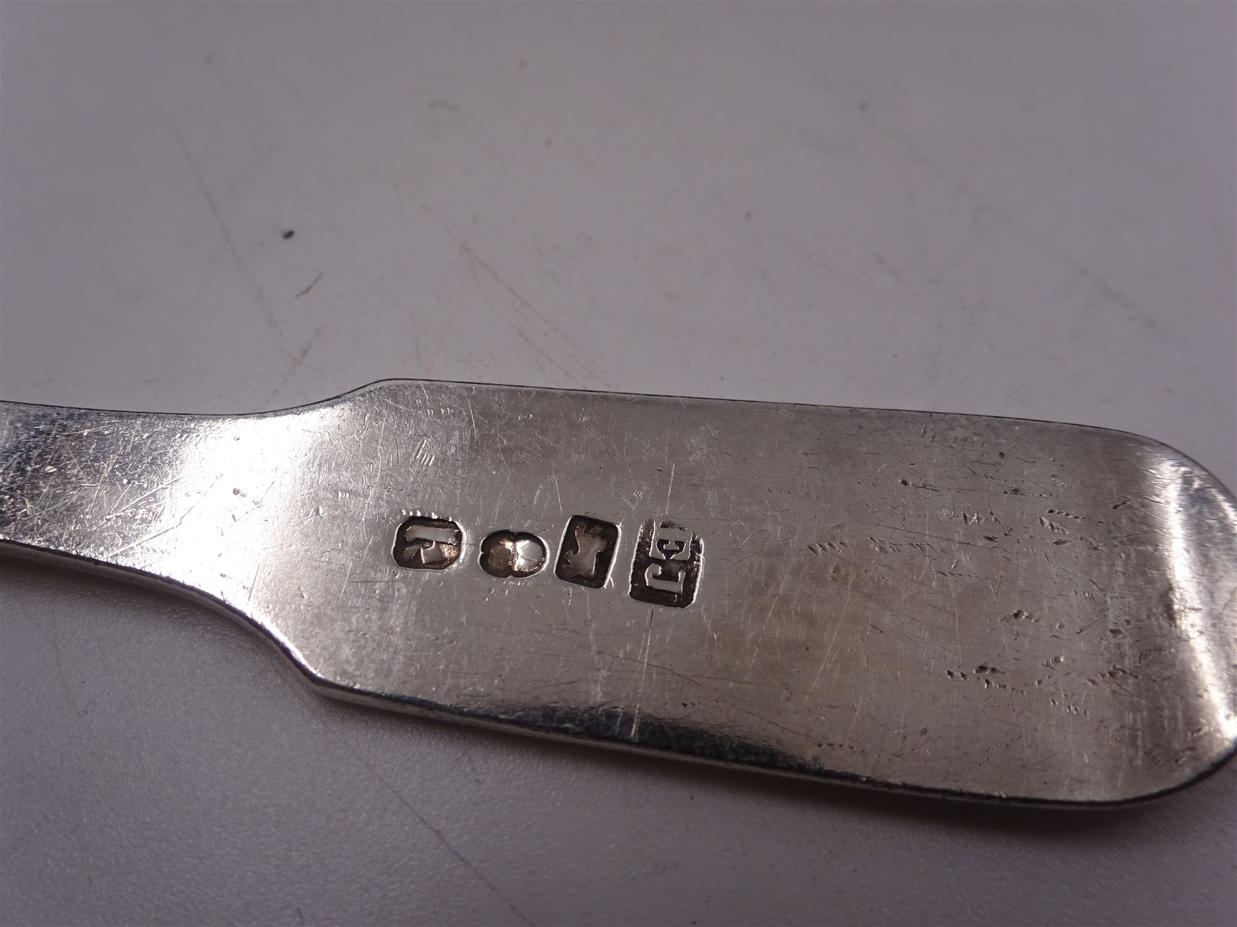 Set of six George IV York silver Fiddle Shell pattern teaspoons, each with engraved initials, hallmarked Edward Jackson, York 1821