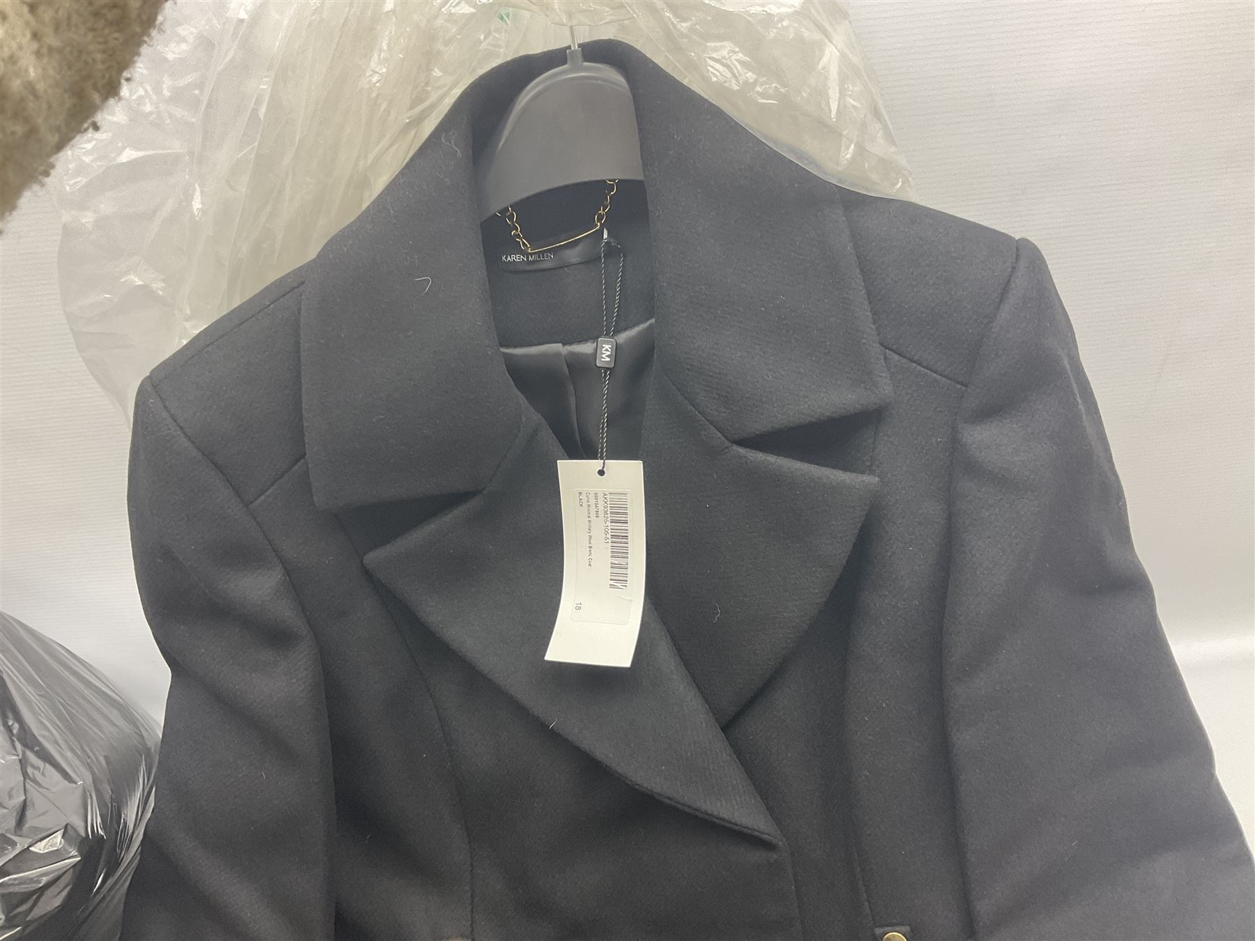 Ex shop stock - three Karen Millen ladies long black wool coats, size 18; four pairs of Rocket Dog ladies leather boots, size 8; and five pairs of Aubin gents trousers, sizes 30-36 (12)