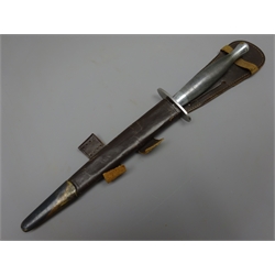  2nd Variant Pattern Commando Knife, 17.5cm twin edged blade, steel cross guard stamped S below Crows foot, and nickel plated brass chequered grip,  L30cm, leather scabbard   