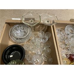 Assorted glassware, to include cut and moulded examples, including candlesticks, dishes, drinking glasses, Carnival glass bowls, light shade, etc., in two boxes 