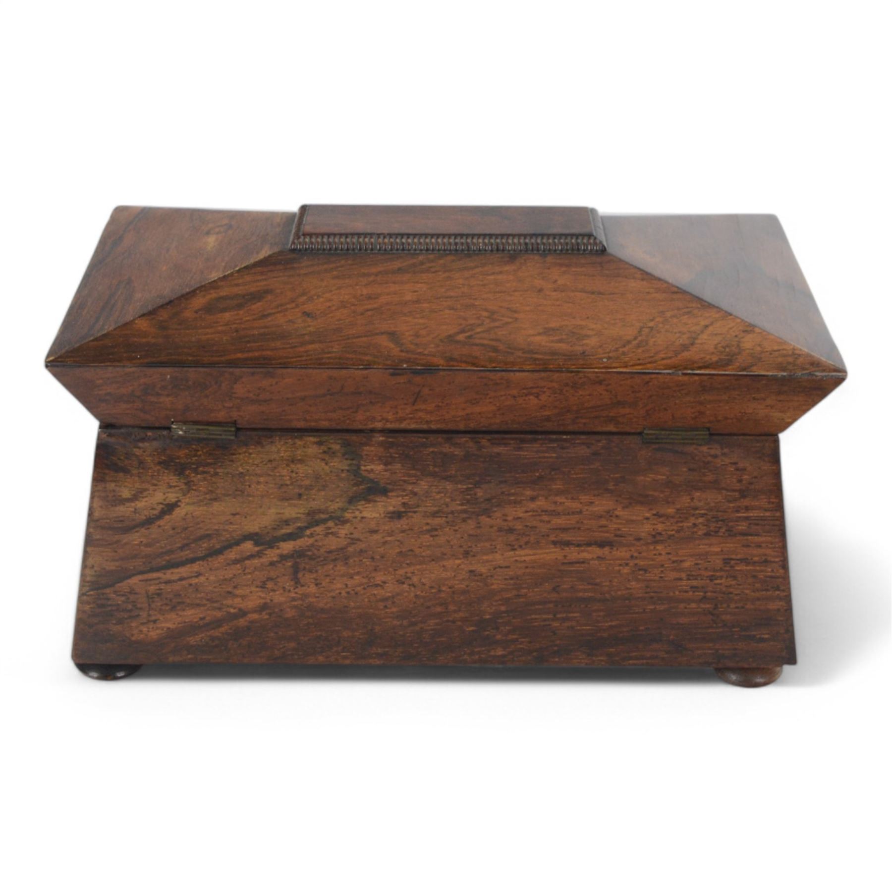 Victorian rosewood tea caddy, of sarcophagus form with mother of pearl escutcheon, upon four squat bun feet, H19cm