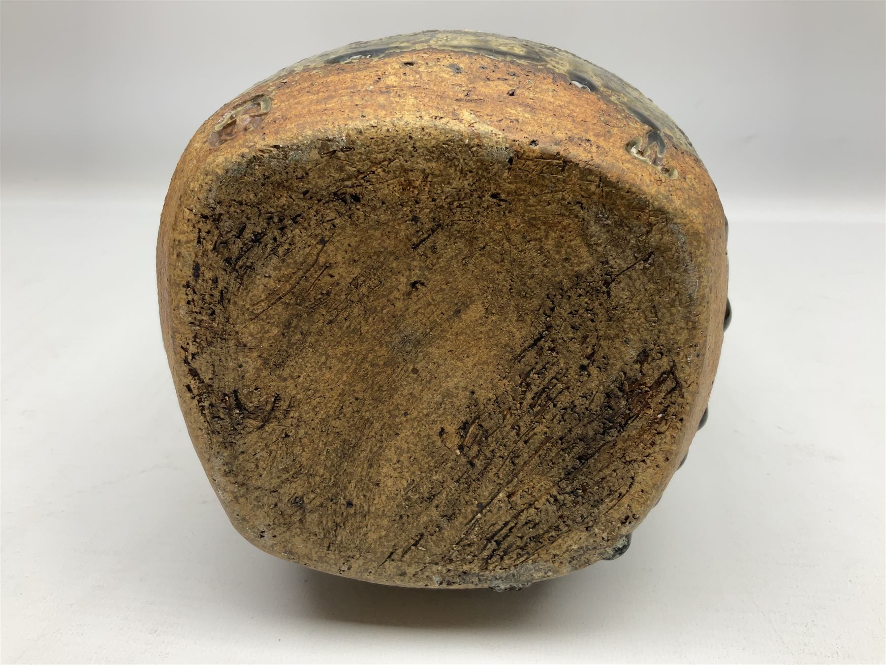 Janet Leach (American, 1918-1997) for Leach Pottery; studio pottery Bizen style vase of tapering form, the stoneware body decorated in a mottled green and brown dripped ash glaze, with impressed J.L. monogram and stamp marks beneath, H30cm