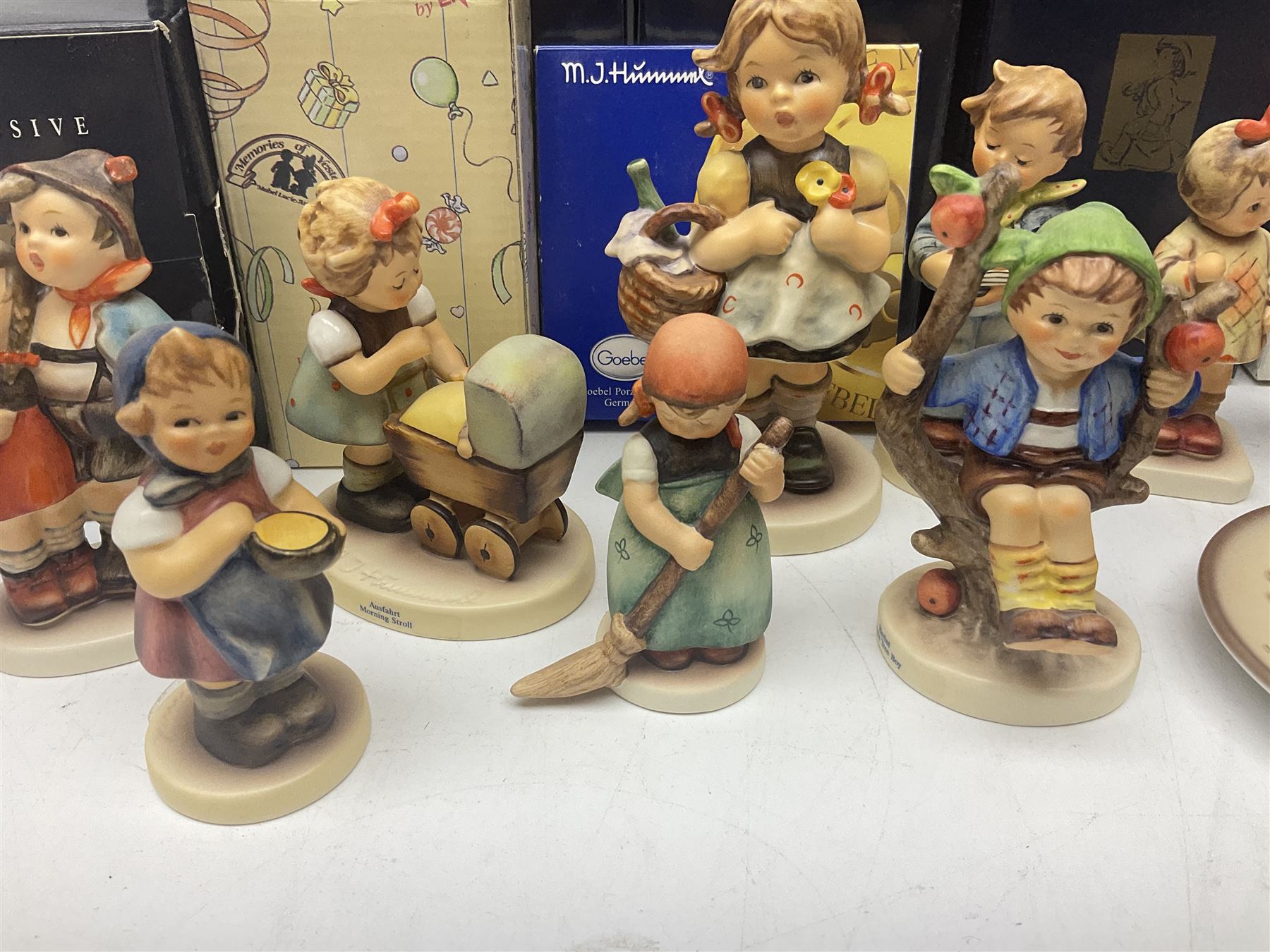 Ten Goebel Hummel figures, to include Morning Stroll, Apple Tree Girl, I brought you a gift, etc together with Enesco Mabel Lucie Atwell figure, ten with original boxes 