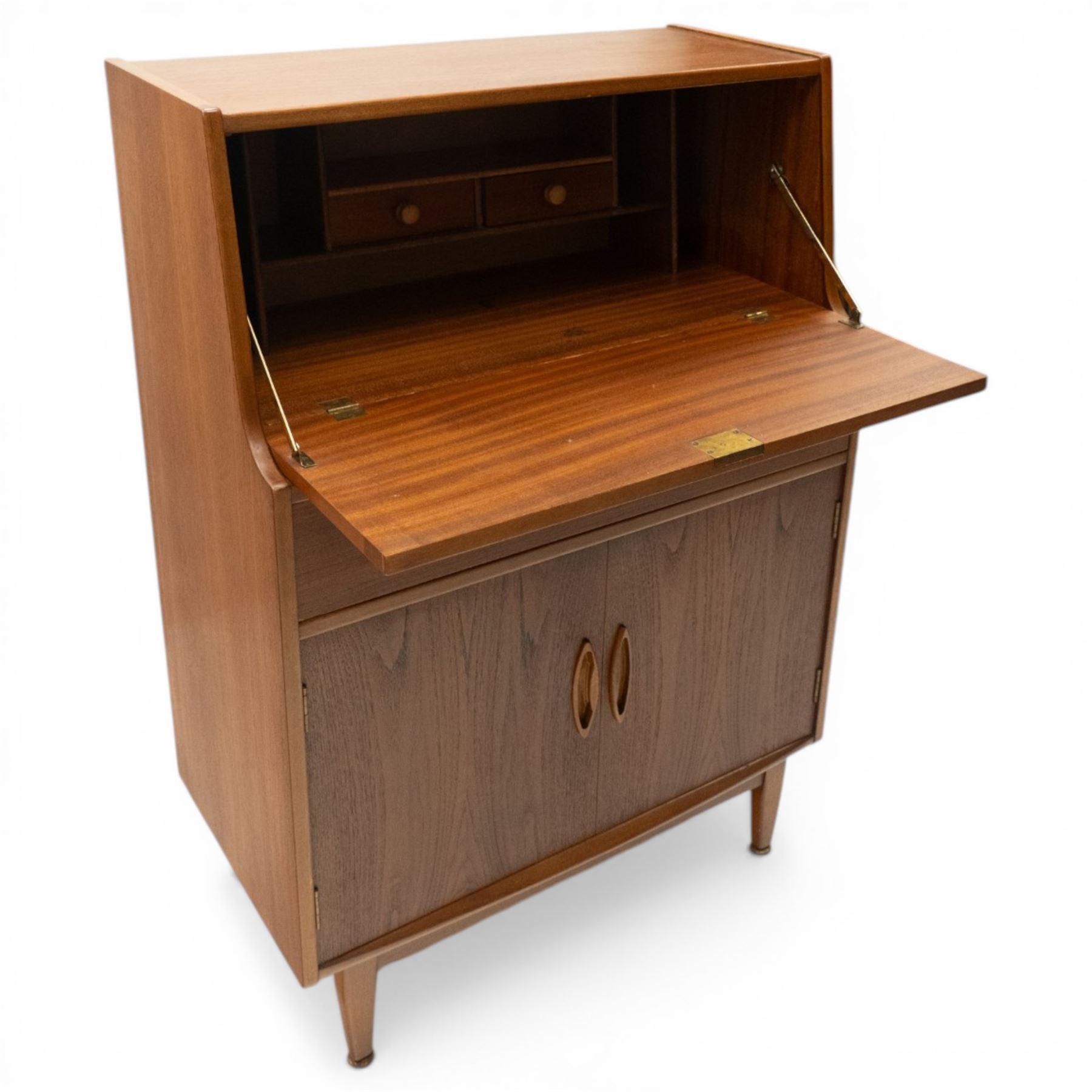 Jentique - mid-20th century teak bureau, fall-front enclosing fitted interior, over single drawer and cupboard fitted with inset handles, on cylindrical tapering feet