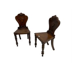 Pair of Victorian mahogany hall chairs, shaped moulded back carved with cartouche, moulded seat on turned front supports