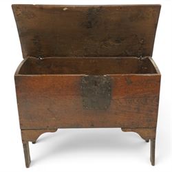 Small 17th century six plank oak coffer, figured top with iron pintle type hinges,  pegged boarded sides, large lock plate with rivets, plank ends continuing down as supports