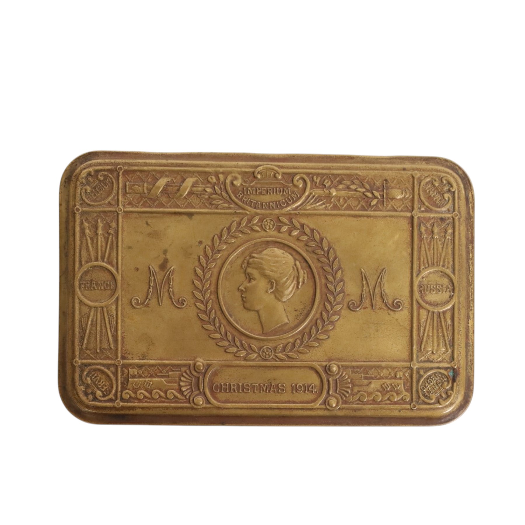  WWI Queen Mary 1914 Christmas tin, together with various cap badges including Lancaster Fusiliers, Manchester Regiment and King's Own Scottish Boarders  