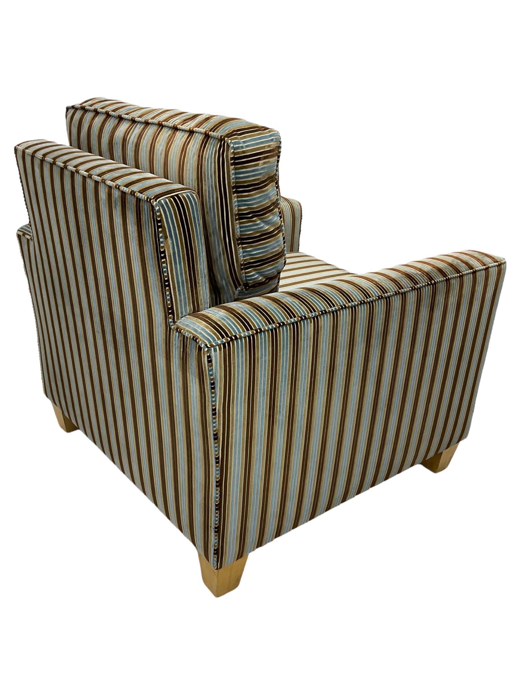 Peter Silk of Helmsley - armchair upholstered in stripe fabric