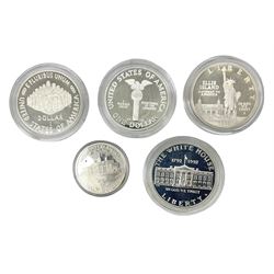 Five United States of America commemorative silver proof coins, comprising 1986, 1987, 1989, 1992 one dollars and 1982 half dollar, all with certificates